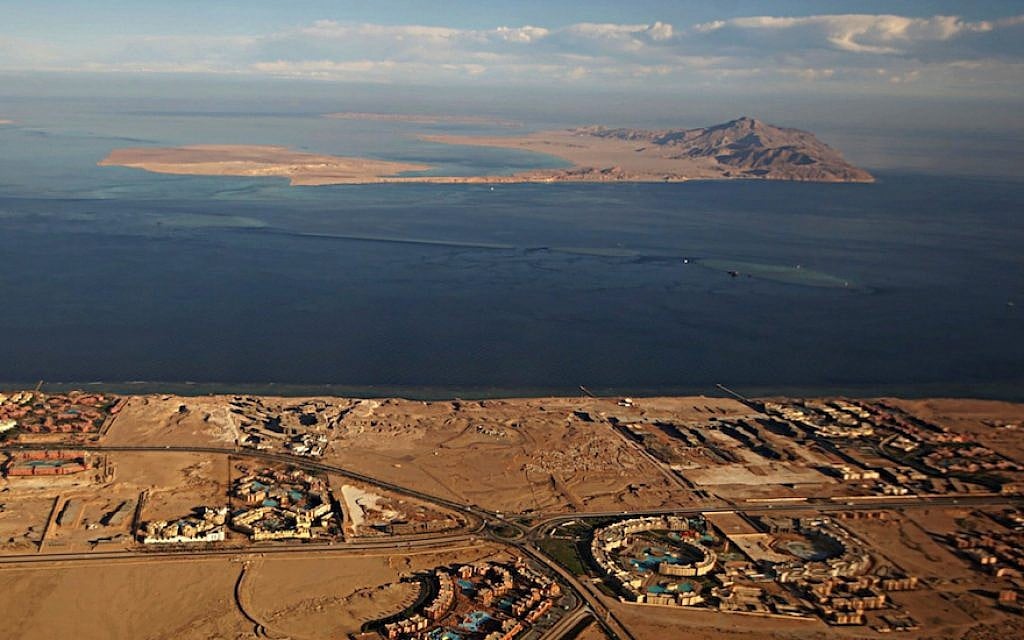 The Red Sea islands of Tiran, in the foreground, and Sanafir, in the background, sit at the the Strait of Tiran between Egypt’s Sinai Peninsula and Saudi Arabia (Stringer/AFP/Getty Images, via JTA)