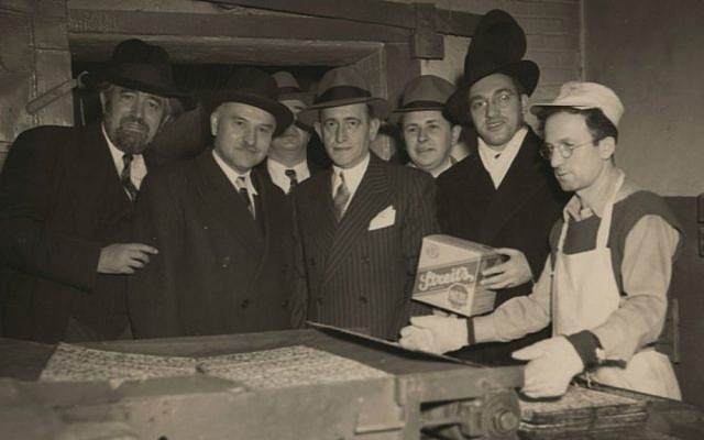 Irving Streit, center, son of Streit's Matzo founder Aron Streit, in an undated photo at New York's Lower East Side factory. (Courtesy of Menemsha Films/via JTA)