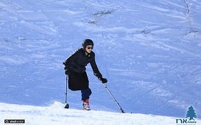 Israelis with disabilities participate in the Erez Foundation ski and snowboard program (Erez Foundation, a search & rescue and contribution to the community/Courtesy)