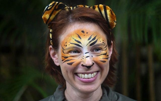 In this March 7, 2015 photo, Stacey Konwiser smiles during the dedication of the new tiger habitat at the Palm Beach Zoo in West Palm Beach, Fla. (Brianna Soukup/Palm Beach Post via AP) In this March 7, 2015 photo, Stacey Konwiser smiles during the dedication of the new tiger habitat at the Palm Beach Zoo in West Palm Beach, Fla. (Brianna Soukup/Palm Beach Post via AP)