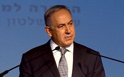 Prime Minister Benjamin Netanyahu speaks before an audience of the union of local authorities in Tel Aviv, April 14, 2016.  (Screenshot/YouTube)