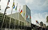 Flags of member nations flying in front of United Nations headquarters in New York, September 25, 2015. (JTA/Michael Gottschalk/Photothek via Getty Images)