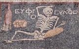 A third century BCE mosaic featuring a skeleton and the words "Be cheerful, enjoy life" found in southern Turkey. (screen capture: Anadolu Agency video)