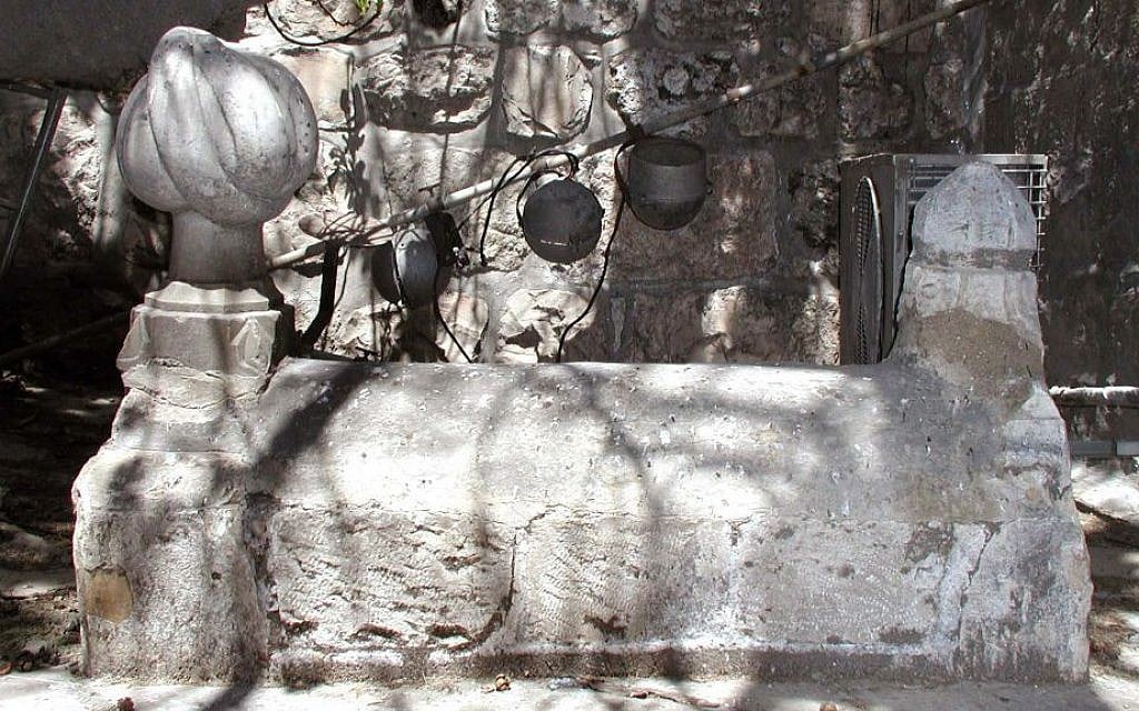 Just inside the gate are unnamed tombs decorated with stone turbans dating back to the Ottomans. (Shmuel Bar-Am)