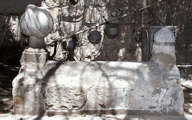 Just inside the gate are unnamed tombs decorated with stone turbans dating back to the Ottomans. (Shmuel Bar-Am)