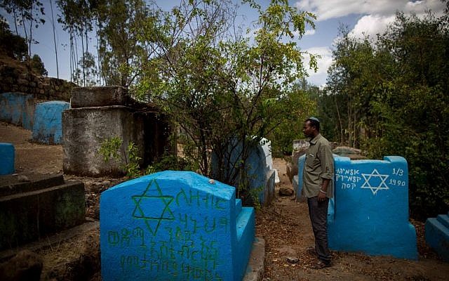 Gashaw Abinet, 29, a cantor at the HaTikvah synagogue in Gondar, visits Wolleka and its Jewish cemetery for the first time on April 24, 2016, although he has lived in Gondar for 17 years awaiting aliyah. (Miriam Alster / Flash9) Gashaw Abinet, 29, a cantor at the HaTikvah synagogue in Gondar, visits Wolleka and its Jewish cemetery for the first time on April 24, 2016, although he has lived in Gondar for 17 years awaiting aliyah. (Miriam Alster / Flash9)