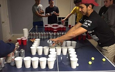A photo posted on social media showing students from a New Jersey school playing a "Jews vs. Nazis" drinking game (Facebook/Jamaica Ponder)