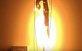 A staff turns into a snake in one of the Technion Rube Goldberg-style Passover projects (Courtesy)