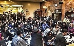 Jews and Muslims participating in a seder at the Islamic Society of Mid Manhattan, organized by the NYC Muslim-Jewish Solidarity Committee, April 14, 2016. (Facebook)