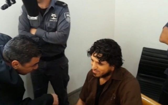 Amin Snobar in Haifa District Court on April 21, 2016. (Screen capture: Ynet news)