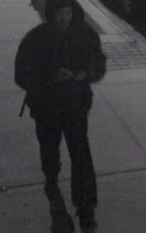NYPD release a still shot from security footage of a suspect believed to be behind a series of graffiti attacks around Brooklyn. NYPD)