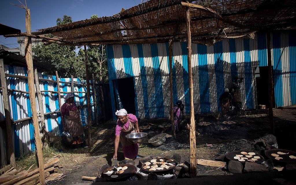 It takes more than 40 people a week to make 50,000 matzahs that the Jewish community of Gondar will eat during the week of Passover. (Miriam Alster/Flash90)