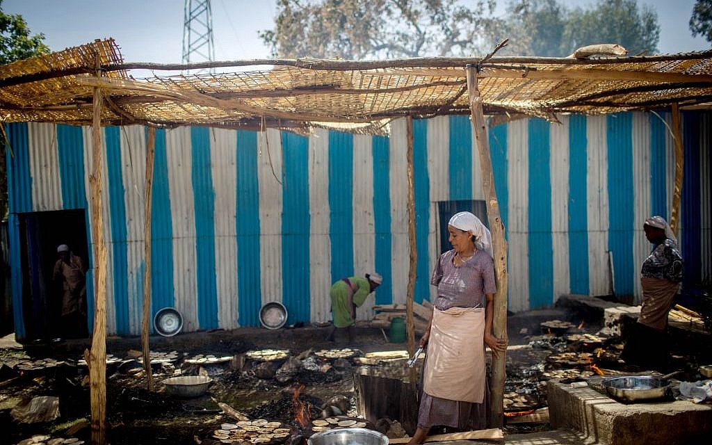Members of Gondar's Jewish community prepare matzah before Passover on April 20, 2016. (Miriam Alster/Flash90)