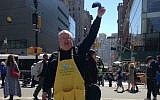 Marc Daniels sells his kippas at a Bernie Sanders event in Union Square in lower Manhattan, New York, April 16 2016. (Courtesy of Marc Daniels)