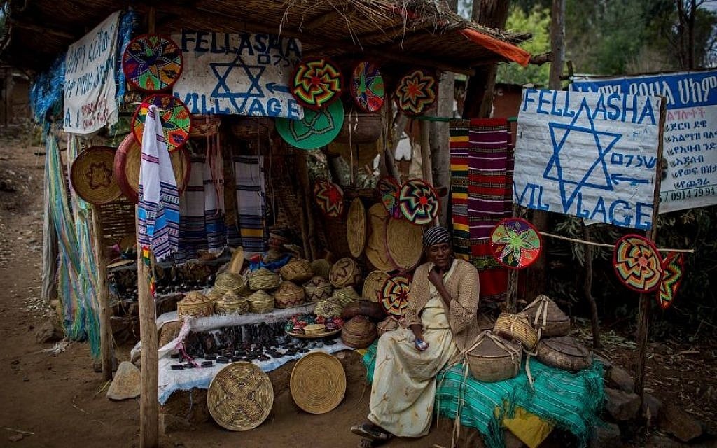 Ethiopia Berihe, 40, next to her craft stand at the entrance to Wolleka village, Gondar, Ethiopia, on April 24, 2016. (Miriam Alster/Flash 90). Ethiopia Berihe, 40, next to her craft stand at the entrance to Wolleka village, Gondar, Ethiopia, on April 24, 2016. (Miriam Alster/Flash 90).
