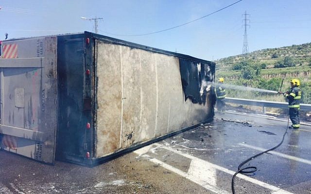 Fire-fighters at the scene of a crash in the West Bank, April 29, 2016 (Courtesy: Judea and Samaria fire department) Fire-fighters at the scene of a crash in the West Bank, April 29, 2016 (Courtesy: Judea and Samaria fire department)