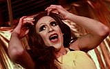 Israeli drag queen Yossale performs on stage at the Video bar in Jerusalem's Old City on February 23, 2016. (AFP Photo/Gil Cohen-Magen)
