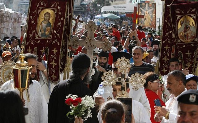 Christian Orthodox worshippers take part in the "Holy Fire" ceremony outside the Church of the Nativity in the biblical West Bank town of Bethlehem on April 30, 2016.(AFP PHOTO / MUSA AL SHAER)
