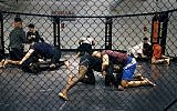 Illustrative: People take part in a MMA (Mixed Martials Arts) training session, on May 2, 2016 in Paris. (Francois Guillot/AFP)