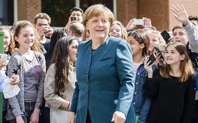 German Chancellor Angela Merkel visits the Lycee Francais School in Berlin, May 3, 2016. (AFP/CLEMENS BILAN) German Chancellor Angela Merkel visits the Lycee Francais School in Berlin, May 3, 2016. (AFP/CLEMENS BILAN)