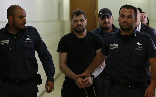 Yosef Haim Ben-David, center, the ringleader in the killing of Palestinian teenager Mohammed Abu Khdeir last year, is escorted by Israeli policemen at the district court in Jerusalem on May 3, 2016. (AFP/AHMAD GHARABLI) Yosef Haim Ben-David, center, the ringleader in the killing of Palestinian teenager Mohammed Abu Khdeir last year, is escorted by Israeli policemen at the district court in Jerusalem on May 3, 2016. (AFP/AHMAD GHARABLI)