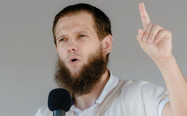 File photo taken on July 19, 2014 shows Islamist preacher Sven Lau aka "Abu Adam" talking during a rally in Hamburg, northern Germany. (AFP PHOTO / DPA / MARKUS SCHOLZ) File photo taken on July 19, 2014 shows Islamist preacher Sven Lau aka "Abu Adam" talking during a rally in Hamburg, northern Germany. (AFP PHOTO / DPA / MARKUS SCHOLZ)