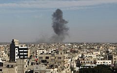 Smoke rises following an Israeli air strike in Rafah, in the southern Gaza Strip, on May 5, 2016. (AFP/Said Khatib)