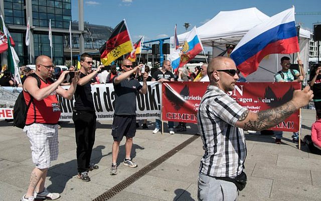 Right-wing protesters take part in a rally against German Chancellor Angela Merkel's migration policies in Berlin on May 7, 2016. (Bernd von Jutrczenka/DPA/AFP) Right-wing protesters take part in a rally against German Chancellor Angela Merkel's migration policies in Berlin on May 7, 2016. (Bernd von Jutrczenka/DPA/AFP)