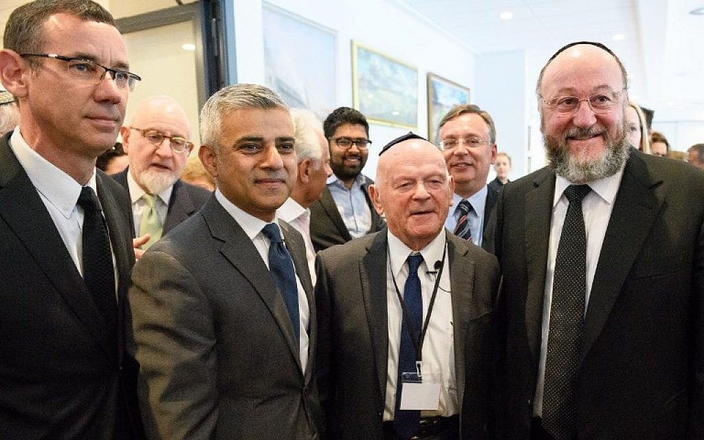 Illustrative: From left to right, Israeli Ambassador Mark Regev, London Mayor Sadiq Khan, Holocaust survivor and Olympian Ben Helfgott and Chief Rabbi Ephraim Mirvis of the United Congregations of the Commonwealth attend the Yom HaShoah Commemoration, the British Jewish community's Holocaust remembrance ceremony, in Barnet, north London, on May 8, 2016. (AFP PHOTO/LEON NEAL)