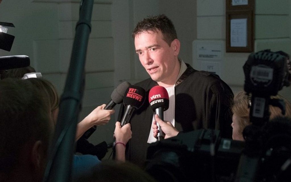 Lawyer Sebastien Courtoy talks to the press at the start of the case against the jihadist cell from Verviers, at the Brussels correctional court, on May 9, 2016. (AFP/Belga/Benoit Doppagne)