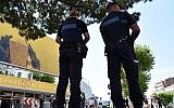 French police officers stand guard outside the Palais des Festivals in the southeastern French city of Cannes on May 10, 2016 on the eve of the opening ceremony of the 69th Cannes Film Festival. AFP/ ALBERTO PIZZOLI)
