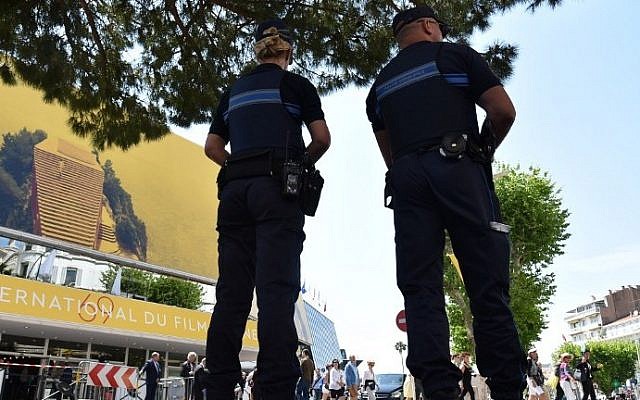 French police officers stand guard outside the Palais des Festivals in the southeastern French city of Cannes on May 10, 2016 on the eve of the opening ceremony of the 69th Cannes Film Festival. AFP/ ALBERTO PIZZOLI) French police officers stand guard outside the Palais des Festivals in the southeastern French city of Cannes on May 10, 2016 on the eve of the opening ceremony of the 69th Cannes Film Festival. AFP/ ALBERTO PIZZOLI)