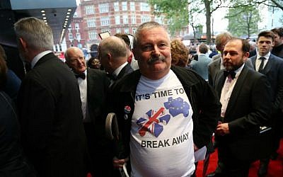 A guest poses for pictures as he arrives for the world premiere of the film 'Brexit: the Movie' in London's Leicester Square, on May 11, 2016. (Justin Tallis/AFP)