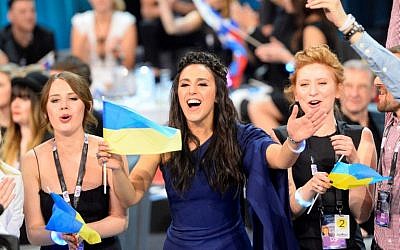 Jamala representing Ukraine celebrates as she advances to the grand final, after qualifying in the second semi-final of the Eurovision Song Contest 2016 in Stockholm, Sweden, on May 12, 2016. (AFP PHOTO / JONATHAN NACKSTRAND)