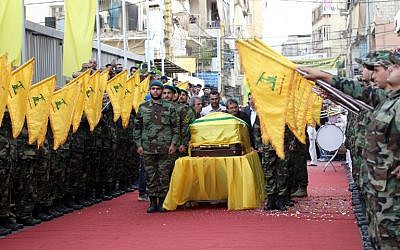 Members and supporters of Lebanon's Shiite terrorist group Hezbollah carry the coffin of Mustafa Badreddine, a top Hezbollah commander who was killed in an attack in Syria, during his funeral in the Ghobeiry neighborhood of southern Beirut on May 13, 2016. (AFP PHOTO / ANWAR AMRO) Members and supporters of Lebanon's Shiite terrorist group Hezbollah carry the coffin of Mustafa Badreddine, a top Hezbollah commander who was killed in an attack in Syria, during his funeral in the Ghobeiry neighborhood of southern Beirut on May 13, 2016. (AFP PHOTO / ANWAR AMRO)