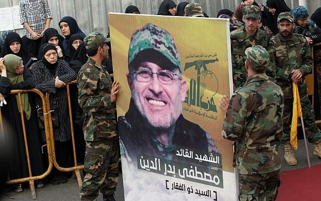 Members of Lebanon's Shiite militant group Hezbollah carry a portrait of Mustafa Badreddine in Beirut on May 13, 2016. (AFP/Anwar Amro) Members of Lebanon's Shiite militant group Hezbollah carry a portrait of Mustafa Badreddine in Beirut on May 13, 2016. (AFP/Anwar Amro)