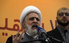 File: Hezbollah Deputy Secretary General Naim Qassem speaks in the Ghobeiry neighborhood of southern Beirut on May 13, 2016. (AFP Photo/Stringer)