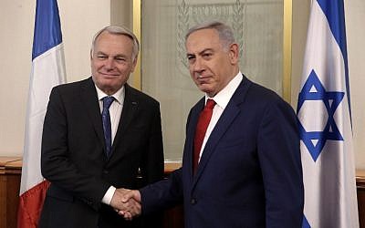 Prime Minister Benjamin Netanyahu, right, shakes hands with French Foreign Minister Jean-Marc Ayrault on May 15, 2016 during a meeting at the Prime Minister's Office in Jerusalem. (AFP Photo/Pool/Menahem Kahana) Prime Minister Benjamin Netanyahu, right, shakes hands with French Foreign Minister Jean-Marc Ayrault on May 15, 2016 during a meeting at the Prime Minister's Office in Jerusalem. (AFP Photo/Pool/Menahem Kahana)