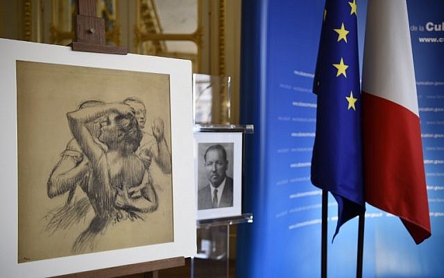 A picture taken on May 9, 2016 at the Culture ministry in Paris shows "Danseuses en buste," a charcoal by late French artist Edgar Degas confiscated by the Nazis in 1940 during its restitution ceremony to  heirs of late French collector Maurice Dreyfus. (AFP/LIONEL BONAVENTURE)