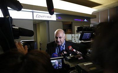 An unidentified employee of Egyptair speaks to journalists at the Roissy-Charles De Gaulle airport near Paris on May 19, 2016. (AFP / THOMAS SAMSON)