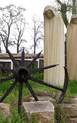 A memorial to the Romany Holocaust victims which was unveiled in 2000 at the Mirovice cemetery next to a huge industrial pig farm situated at the site of former concentration camp in Lety, south Bohemia, May 4, 2005. (AFP/MICHAL CIZEK)