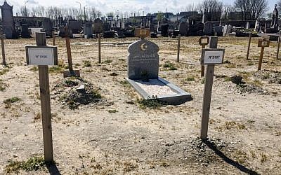 This file photo taken on April 19, 2016 shows graves of migrants at a cemetery in Calais. (AFP Photo/Denis Charlet)