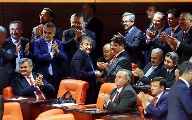 Binali Yildirim (third from right), the likely new leader of Turkey's ruling AK Party, is surrounded by his fellow MPs as he attends a debate at the Turkish parliament in Ankara on May 20, 2016. (AFP Photo/Adem Altan) Binali Yildirim (third from right), the likely new leader of Turkey's ruling AK Party, is surrounded by his fellow MPs as he attends a debate at the Turkish parliament in Ankara on May 20, 2016. (AFP Photo/Adem Altan)