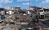 In this May 23, 2016 image, Syrians gather at the site of multiple bombings that left tens dead in the northern coastal city of Jableh, between Latakia and Tartus. (AFP Photo/Stringer)