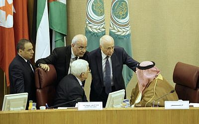 Palestinian Authority President Mahmoud Abbas (bottom left), Palestinian chief negotiator Saeb Erekat (top left), Arab League Secretary General Nabil al-Arabi (second from right) and Bahrain's Foreign Minister Khalid bin Ahmed al-Khalifa (right) speak during a meeting of Arab foreign ministers to discuss a French peace initiative in the Egyptian capital Cairo, on May 28, 2016. (AFP/Stringer) Palestinian Authority President Mahmoud Abbas (bottom left), Palestinian chief negotiator Saeb Erekat (top left), Arab League Secretary General Nabil al-Arabi (second from right) and Bahrain's Foreign Minister Khalid bin Ahmed al-Khalifa (right) speak during a meeting of Arab foreign ministers to discuss a French peace initiative in the Egyptian capital Cairo, on May 28, 2016. (AFP/Stringer)
