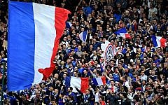 France's supporters cheer during the friendly soccer match between France and Cameroon, at the Beaujoire Stadium in Nantes, western France, on May 30, 2016. (AFP PHOTO / FRANCK FIFE)