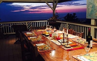 Guests enjoy meals on the open-air 'lanai,' an outdoor porch popular in Hawaii. Prior to running the bed and breakfast, Shai Yerlick operated a successful catering business in the San Francisco area (Facebook) Guests enjoy meals on the open-air 'lanai,' an outdoor porch popular in Hawaii. Prior to running the bed and breakfast, Shai Yerlick operated a successful catering business in the San Francisco area (Facebook)