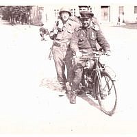 "Two Russian soldiers and a GI of the 104th. Incidentally that's a German motorbike he's riding. Wurzen Germany. April 27, 1945" (Jules Helfner)