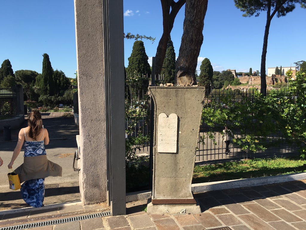 At the entrance to the garden is a memorial plaque in the shape of the Stone Tablets on which the Ten Commandments were etched. From 1645 through 1934, the Jewish community of Italy buried their deceased here (Rossella Tercatin) At the entrance to the garden is a memorial plaque in the shape of the Stone Tablets on which the Ten Commandments were etched. Jewish visitors to the site often leave small stones atop the plaque, just as they do by a tombstone to honor the dead (Rossella Tercatin/Times of Israel)
