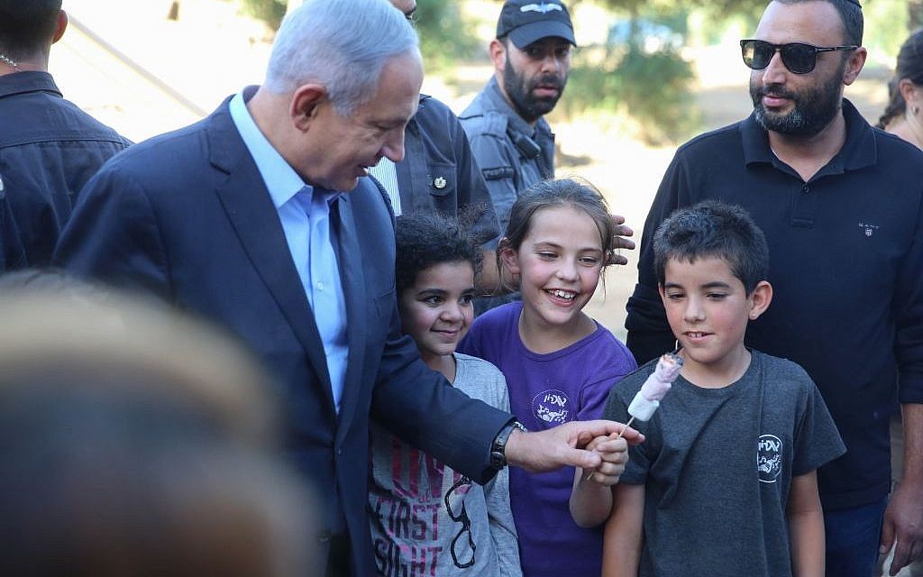 Prime Minister Benjamin Netanyahu makes a surprise visit to a Lag B'Omer bonfire in Jerusalem on May 25, 2016 (photo courtesy of Likud) Prime Minister Benjamin Netanyahu makes a surprise visit to a Lag B'Omer bonfire in Jerusalem on May 25, 2016 (photo courtesy of Likud)